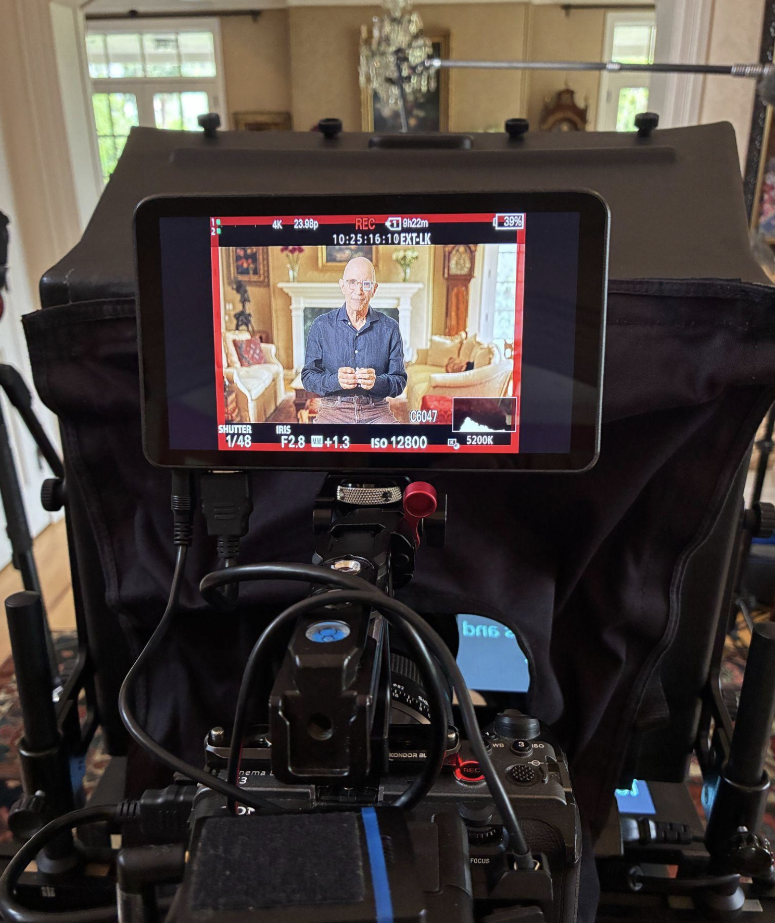 Camera monitor showing Dr. Mark Tager during a recording
