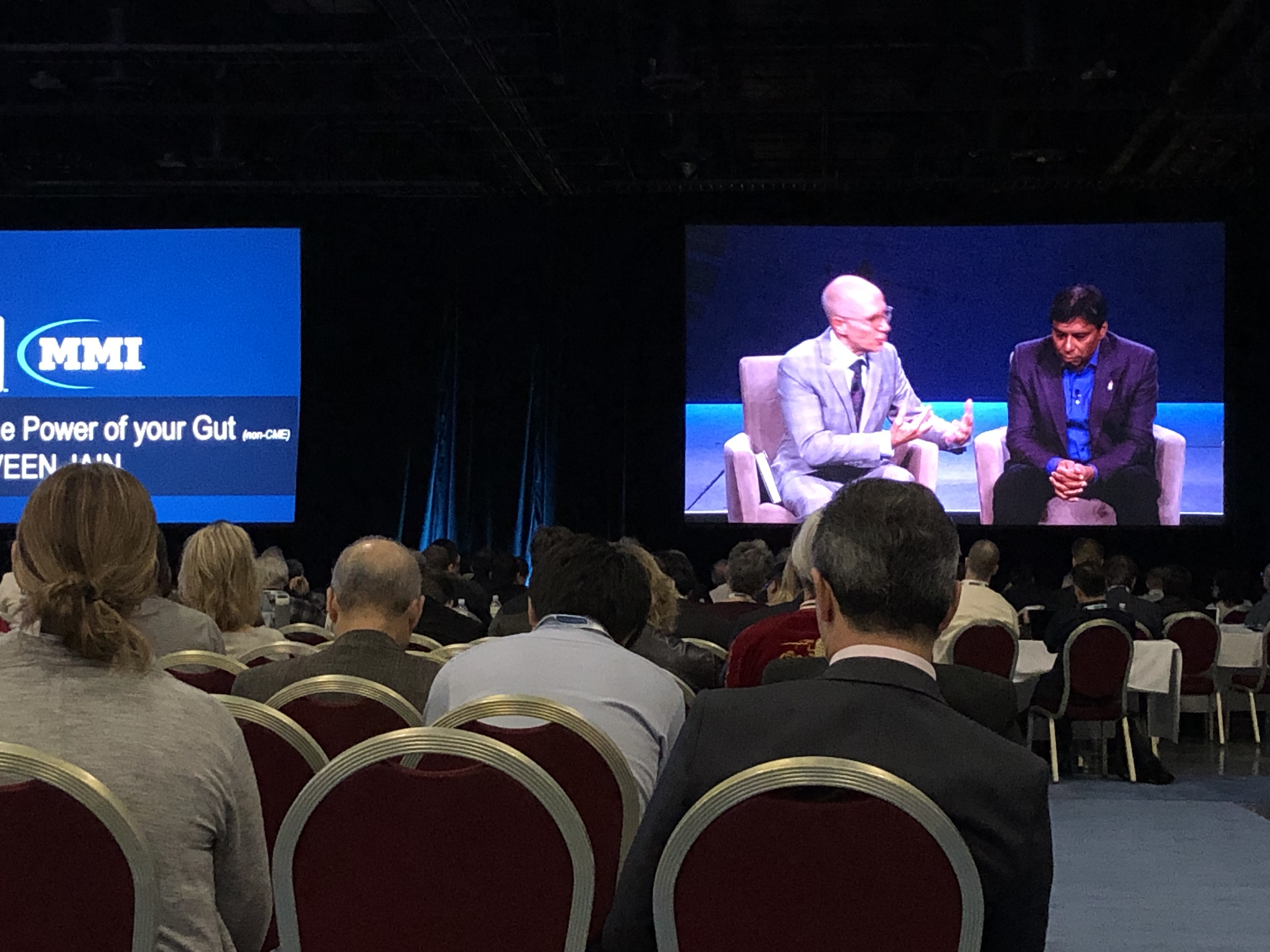 Dr. Tager speaking to an audience at a conference