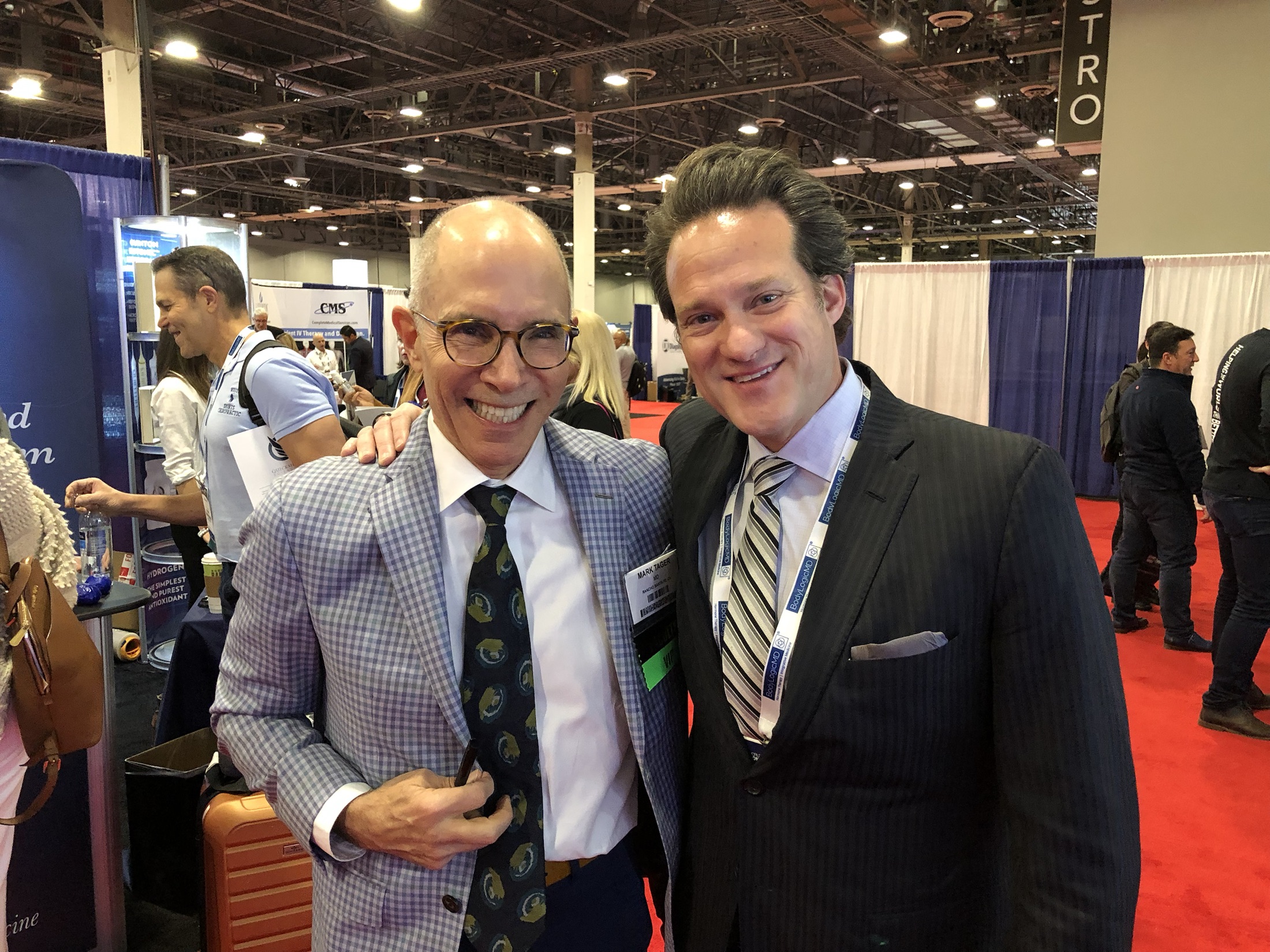 Dr. Tager with a colleague at a healthcare conference