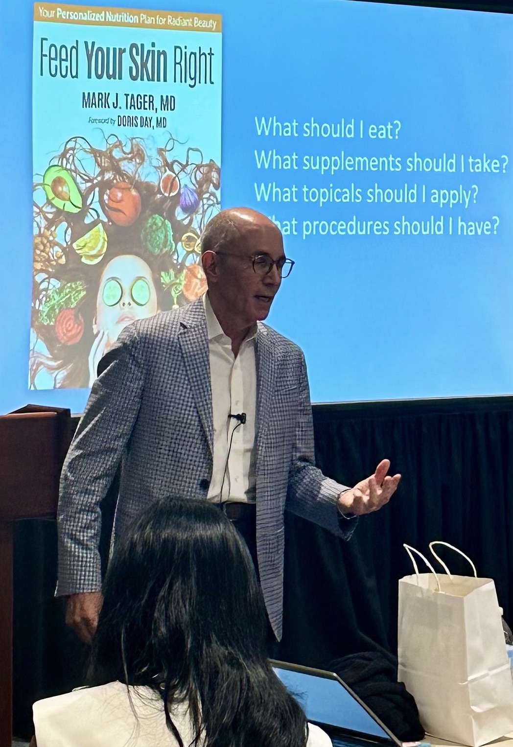 Dr. Tager teaching from Feed Your Skin Right